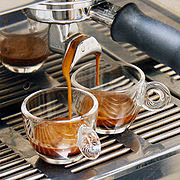 An espresso shot has about the same caffeine content as a cup of brewed coffee